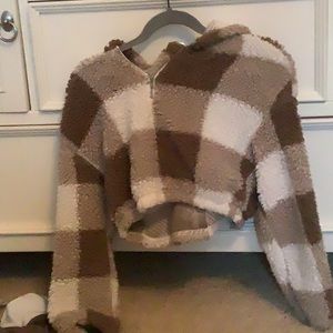 Cozy cropped hoodie, well for winter, and would fit the body apocalypse a 8 Y.O